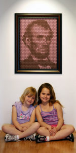Penny Portrait on Wall with Kids