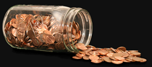 Spilled jar of pennies